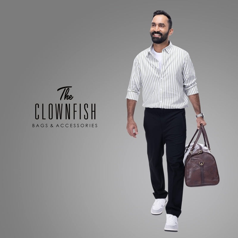 The Clownfish faux leather 27 Cms Travel Duffle(TCFDBFL-R34LCHO1_Brown)